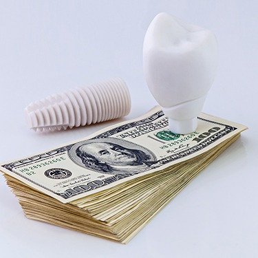 Dental implant on money