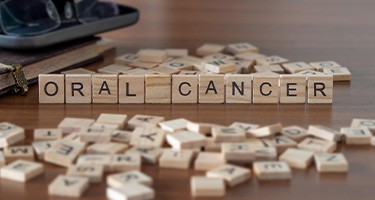 wooden blocks spelling out oral cancer