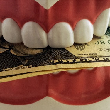 Money in a set of teeth