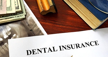 Dental insurance form on a table