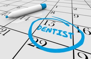 date of dental checkup circled on calendar 