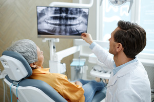 patient talking to a dentist