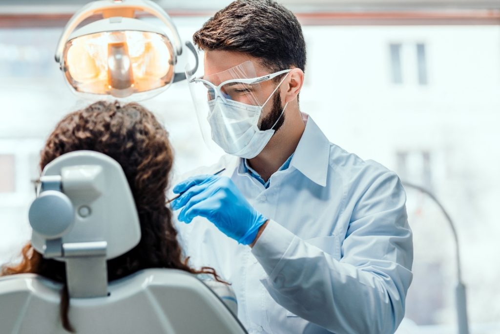 patient preparing to undergo tooth extraction 