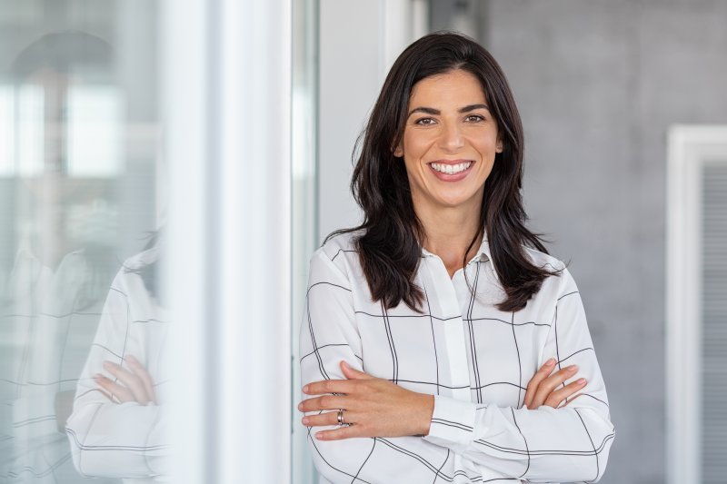a female professional showing off her beautiful smile