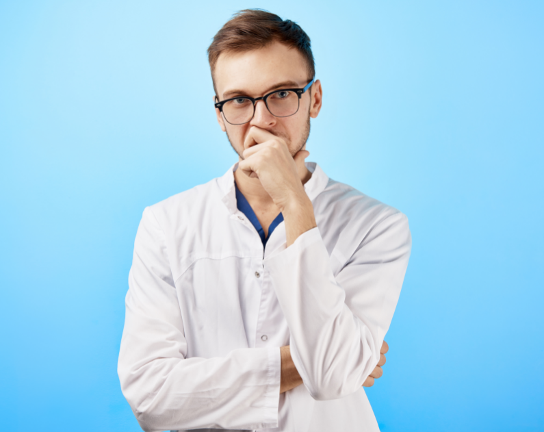 Dentist looking thoughtful